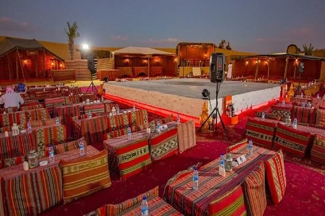 Majlis seating around the show stage at the desert camp